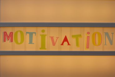 Letters spelling "motivation"