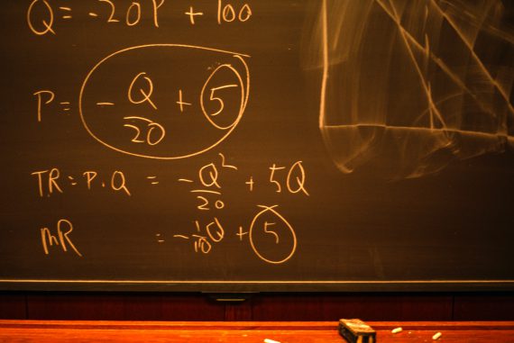 Math formula on chalkboard