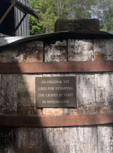 The wine vat at the centre of the controversy, with a plaque reading 'An original vat used for stomping the grapes by foot in winemaking'