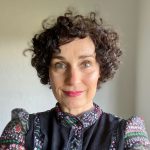 Profile image of a Dr Bianka Malecka. She is smiling at the camera and has short dark curly hair worn down.