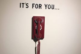 Picture of a phone with the caption, "It's for you"