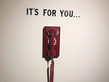 Picture of a phone with the caption, "It's for you"